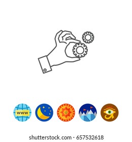 Hand holding gear wheels