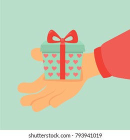 hand holding a gift