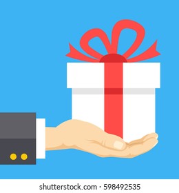 Hand holding gift box. Giftbox with red ribbon and beautiful red bow. Gift, present concepts. Modern flat design graphic elements. Creative vector illustration isolated on blue background