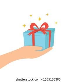 Hand holding a gift box and red ribbon concept.