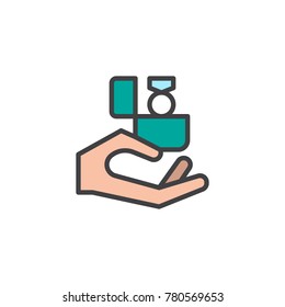 Hand holding gift box with ring filled outline icon, line vector sign, linear colorful pictogram isolated on white. Engagement symbol, logo illustration. Pixel perfect vector graphics