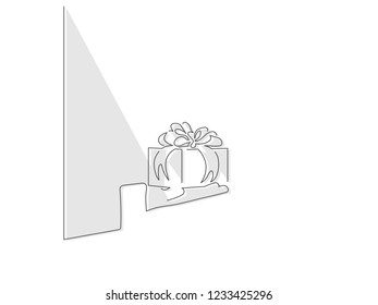 Hand holding a gift isolated line drawing, vector illustration design. Christmas collection.