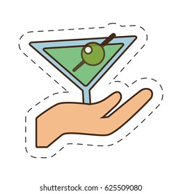 hand holding glass cup cocktail drink