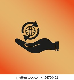 hand holding a globe