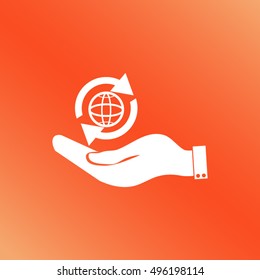 hand holding a globe