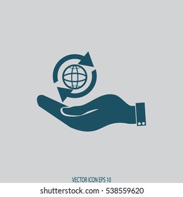 hand holding a globe