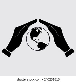 Hand holding Globe earth icon on a grey background