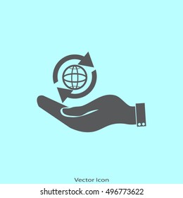 hand holding a globe planet