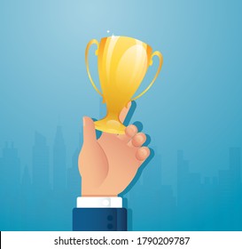 mano sosteniendo la Copa de Trofeo de Oro. Ilustración vectorial del premio trofeo ganador