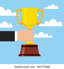 hand holding a gold trophy icon over sky background. colorful design. vector illustration