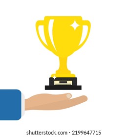 A hand holding a golden cup on a white background. Vector illustration