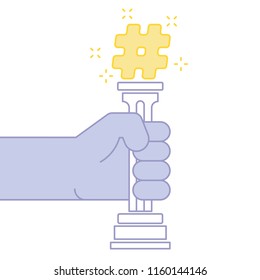 Hand holding Golden hashtag trophy.