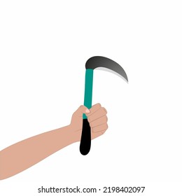 Hand holding grass sickle with green handle isolated on white