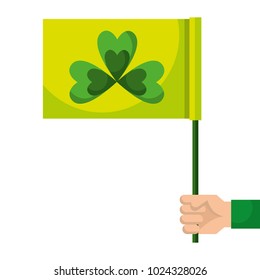 hand holding green flag with clover symbol