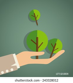 Hand holding Green tree. Vector Illustration.