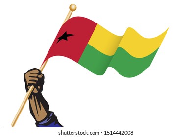 The hand holding the Guinea Bissau flag.