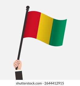 Hand Holding Guinea Waving Flag