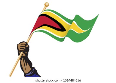 The hand holding the Guyana flag.