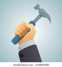 Hand holding hammer. Hardware tools.
