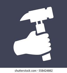 Hand holding hammer icon