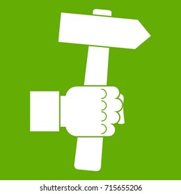 Hand holding hammer with tool icon white isolated on green background. Vector illustration