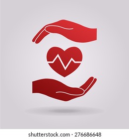 Hand holding heart.