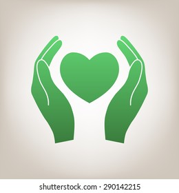 Hand holding heart.