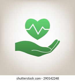 Hand holding heart.