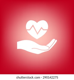 Hand holding heart.
