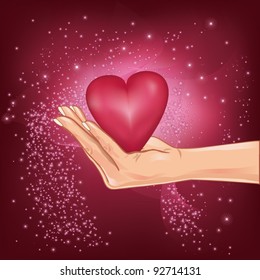 Hand holding a heart