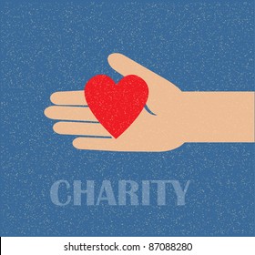 hand holding the heart. charity