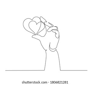 Hand holding heart sign. Continuous one line art drawing style. Black linear sketch isolated on white background. Vector illustration