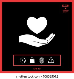 Hand holding heart symbol
