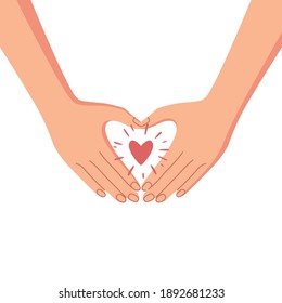 Hand holding a heart. Symbol of volunteer or charity organisations.