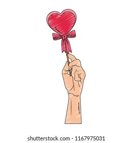 Hand holding heartshape lollipop pop art scribble