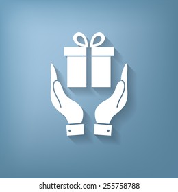 hand holding a Holiday Gift Box Icon. Vector illustration