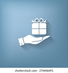 hand holding a Holiday Gift Box Icon. Vector illustration 