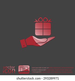 hand holding a Holiday Gift Box Icon. Vector illustration 
