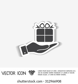 hand holding a Holiday Gift Box Icon. Vector illustration 