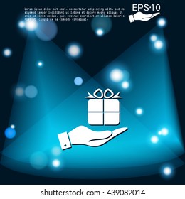hand holding a Holiday Gift Box Icon. Vector illustration 