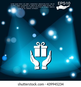 hand holding a Holiday Gift Box Icon. Vector illustration
