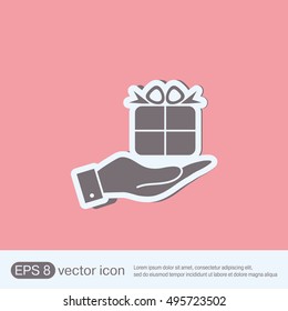 hand holding a Holiday Gift Box Icon. Vector illustration 