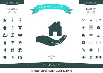 Hand holding home