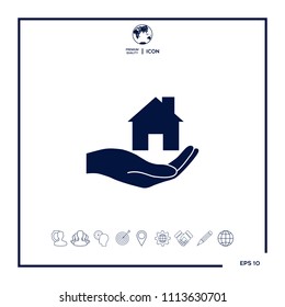 Hand holding home