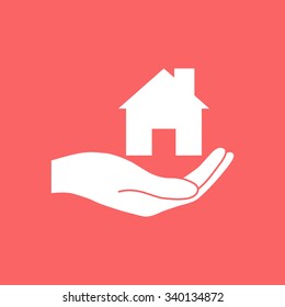 Hand holding home