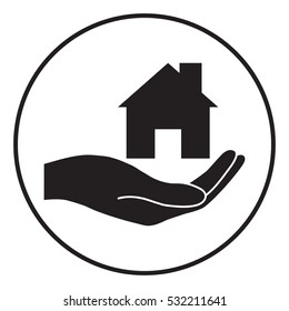 Hand holding home