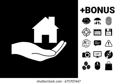 Hand holding home
