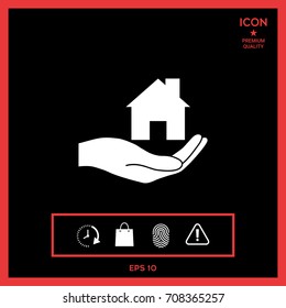 Hand holding home