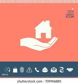 Hand holding home