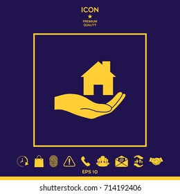 Hand holding home
